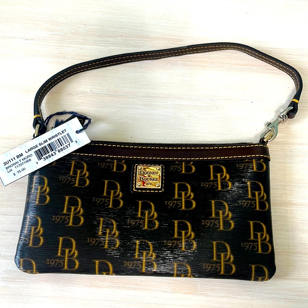 NWT Dooney and Bourke large slim wristlet. Brown T Moro